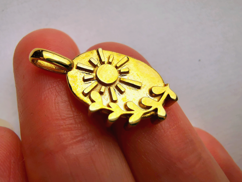 Back side sun and branch jewelry in brass.